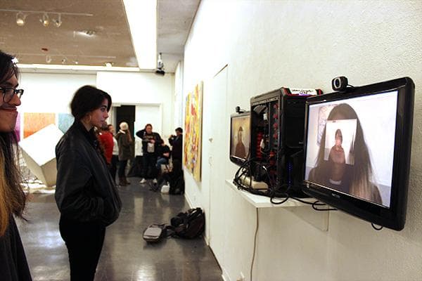 Girl looking at gallery installation 2